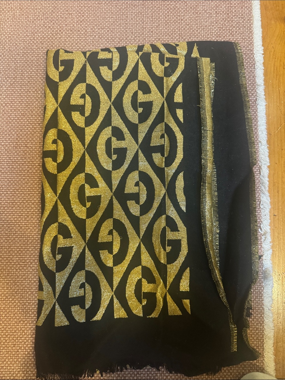 Gucci black with gold GG motifs metallic/lamรฉ woven fiber, approximately 25x80in